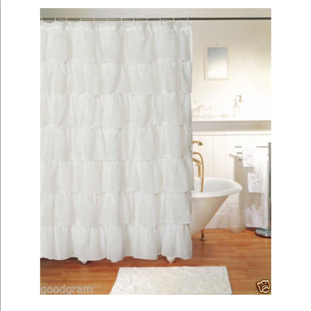 Ruffled white shower curtain